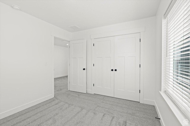 12361 S Xander Ln, Herriman, UT 84096 - unfurnished bedroom with carpet flooring, baseboards, and a closet