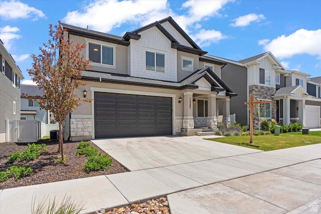 12361 S Xander Ln, Herriman, UT 84096 - craftsman-style house featuring stone siding, a garage, driveway, central AC, and stucco siding