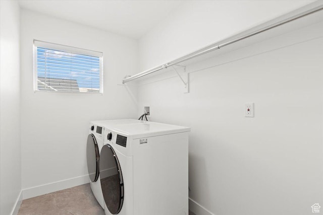 12361 S Xander Ln, Herriman, UT 84096 - laundry area featuring washing machine and clothes dryer and baseboards