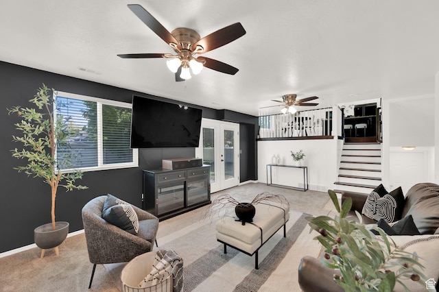524 E 1200 S, Kaysville, UT 84037 - living room featuring carpet flooring, french doors, stairs, a ceiling fan, and baseboards