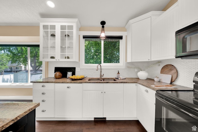 524 E 1200 S, Kaysville, UT 84037 - kitchen featuring black appliances, a sink, stone counters, and decorative backsplash