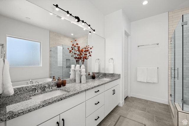5472 N Valley View Rd W, Lehi, UT 84043 - full bathroom with double vanity, a shower stall, recessed lighting, a bathtub, and baseboards