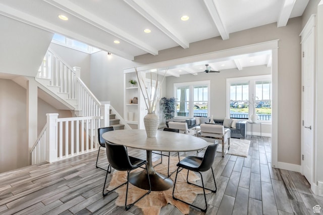 10764 S Felicity Ct, South Jordan, UT 84009 - dining room featuring wood finish floors, beam ceiling, recessed lighting, stairway, and baseboards