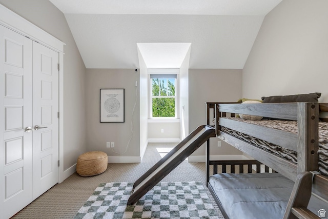 10764 S Felicity Ct, South Jordan, UT 84009 - bedroom with carpet floors, lofted ceiling, and baseboards