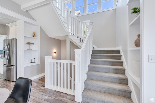 10764 S Felicity Ct, South Jordan, UT 84009 - stairs with built in features and wood finished floors