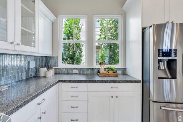 10764 S Felicity Ct, South Jordan, UT 84009 - kitchen featuring stainless steel refrigerator with ice dispenser, tasteful backsplash, glass insert cabinets, and white cabinetry