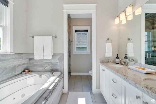 10764 S Felicity Ct, South Jordan, UT 84009 - bathroom with a stall shower, tile patterned flooring, double vanity, a whirlpool tub, and toilet