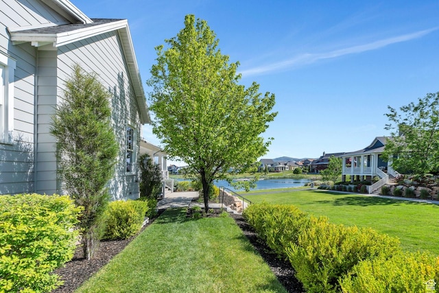10764 S Felicity Ct, South Jordan, UT 84009 - view of grassy yard with a water view and a residential view