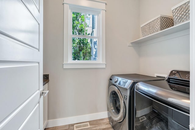 10764 S Felicity Ct, South Jordan, UT 84009 - laundry area with independent washer and dryer, baseboards, and cabinet space