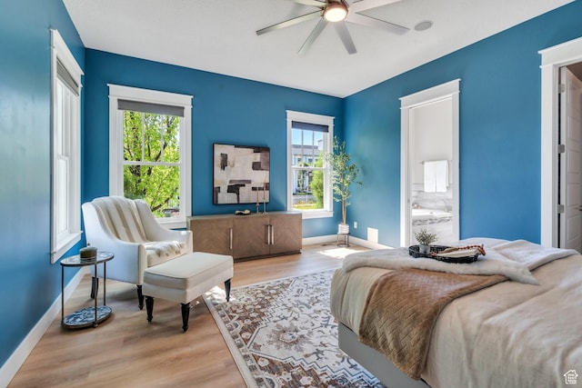 10764 S Felicity Ct, South Jordan, UT 84009 - bedroom with baseboards, wood finished floors, and a ceiling fan