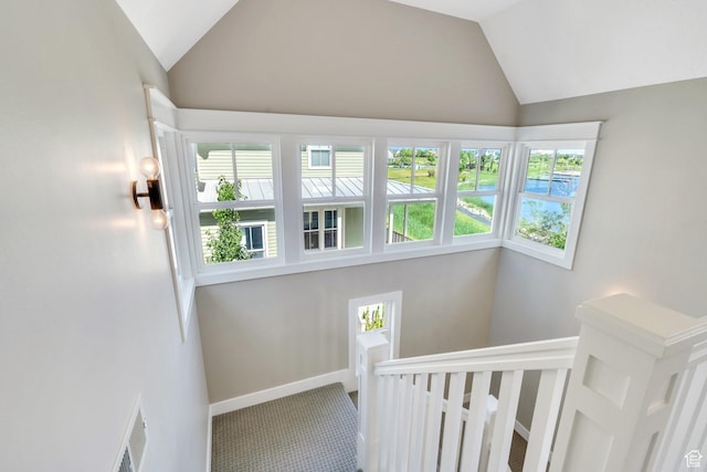 10764 S Felicity Ct, South Jordan, UT 84009 - stairway with lofted ceiling, carpet floors, and baseboards