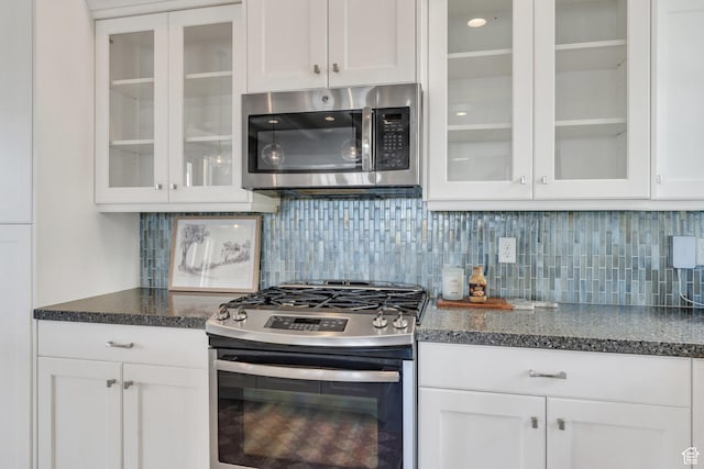 10764 S Felicity Ct, South Jordan, UT 84009 - kitchen with stainless steel appliances, white cabinetry, and glass insert cabinets