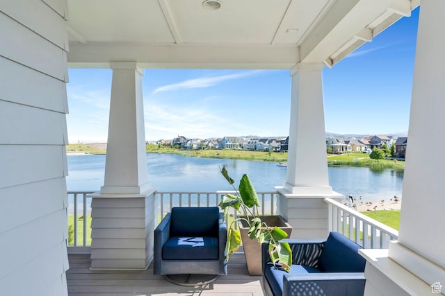 10764 S Felicity Ct, South Jordan, UT 84009 - covered porch with a water view and a residential view