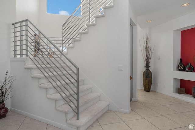 4554 W Birdie Way S, Jordan, UT 84009 - stairs featuring tile patterned floors, recessed lighting, and baseboards