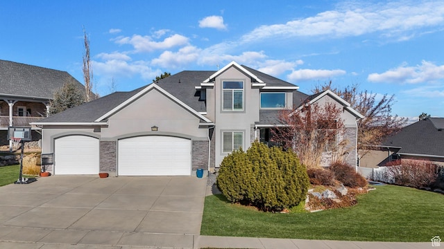 4554 W Birdie Way S, Jordan, UT 84009 - traditional home featuring stucco siding, concrete driveway, an attached garage, and stone siding