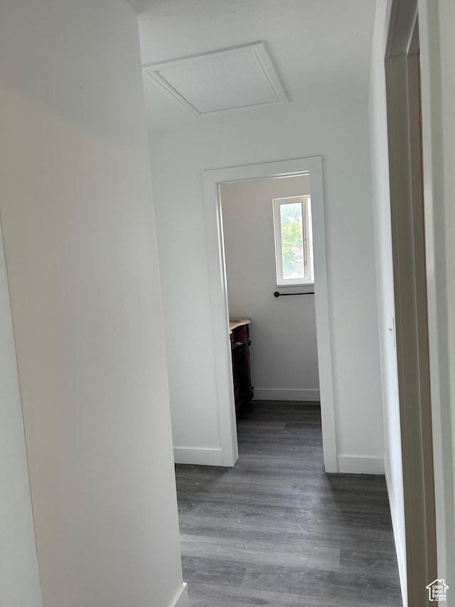 3086 S Fernbush Dr, Magna, UT 84044 - hall with baseboards, wood finished floors, and attic access