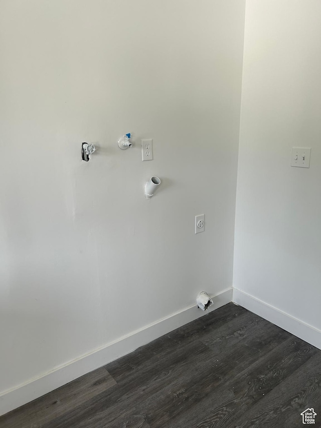 3086 S Fernbush Dr, Magna, UT 84044 - washroom with electric dryer hookup, dark wood-style floors, and baseboards