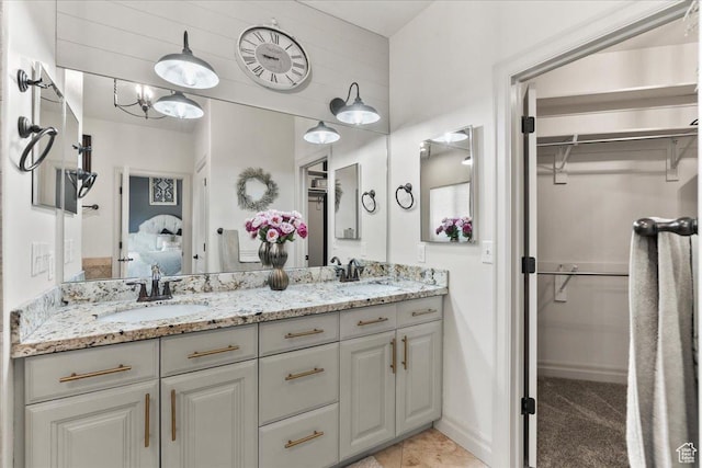 521 W Western Dr S, Kaysville, UT 84037 - bathroom with double vanity, ensuite bath, and a spacious closet