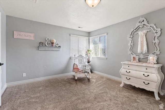 521 W Western Dr S, Kaysville, UT 84037 - living area featuring carpet flooring, baseboards, and a textured ceiling