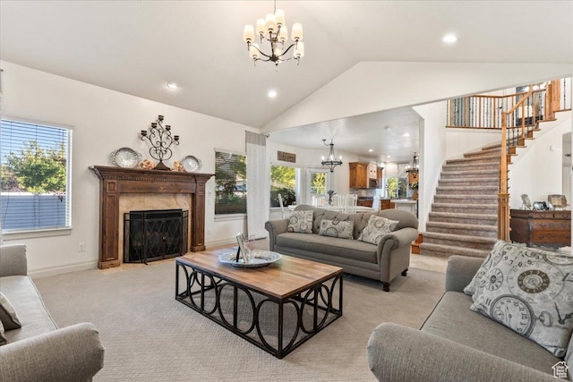 521 W Western Dr S, Kaysville, UT 84037 - living area with a chandelier, stairway, light carpet, recessed lighting, and a premium fireplace