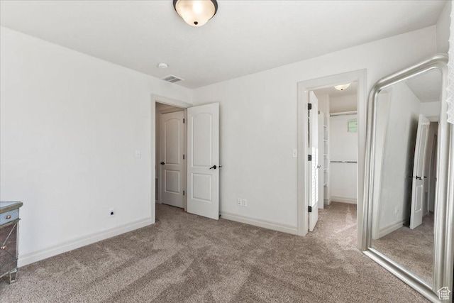 521 W Western Dr S, Kaysville, UT 84037 - unfurnished bedroom featuring carpet, a spacious closet, and baseboards