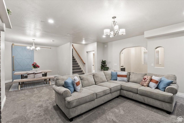 521 W Western Dr S, Kaysville, UT 84037 - carpeted living room with a chandelier, stairway, and baseboards