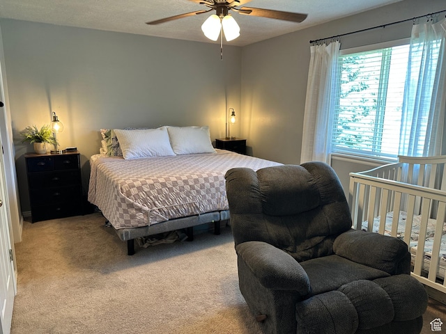 750 S 400 E Unit 38, Brigham City, UT 84302 - bedroom featuring light carpet and a ceiling fan