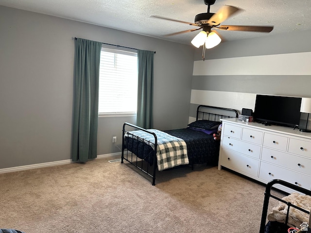 750 S 400 E Unit 38, Brigham City, UT 84302 - bedroom featuring light carpet, a textured ceiling, and ceiling fan
