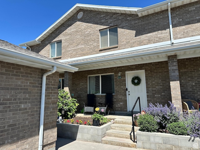 750 S 400 E Unit 38, Brigham City, UT 84302 - doorway to property featuring a porch and brick siding