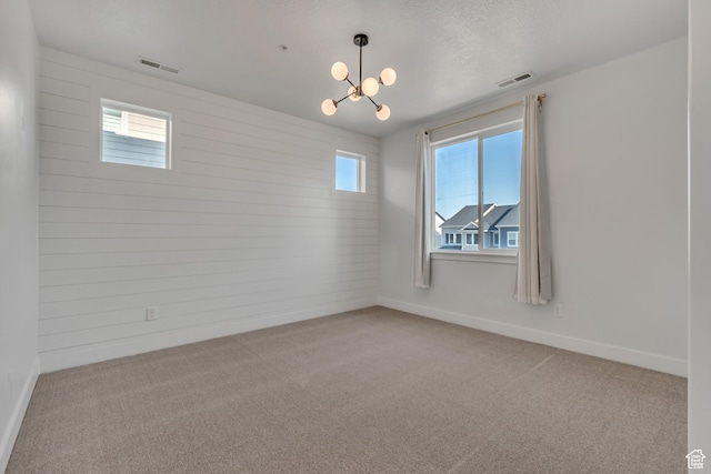 3919 W 1530 N Unit 202, Lehi, UT 84043 - carpeted empty room with a chandelier, wooden walls, and baseboards