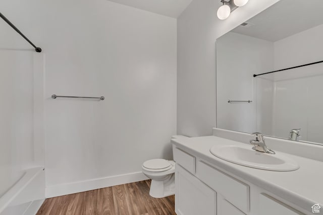 3919 W 1530 N Unit 202, Lehi, UT 84043 - full bath with vanity, toilet, wood finished floors, bathing tub / shower combination, and baseboards