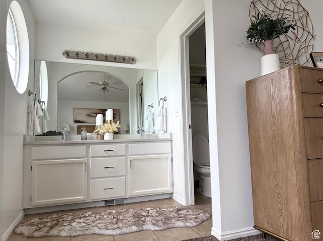 206 E Handcart Way, Sandy, UT 84070 - full bath with a closet, double vanity, a ceiling fan, toilet, and tile patterned flooring