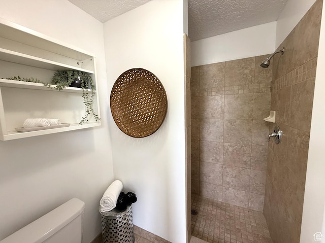 206 E Handcart Way, Sandy, UT 84070 - full bath featuring tiled shower, toilet, and a textured ceiling