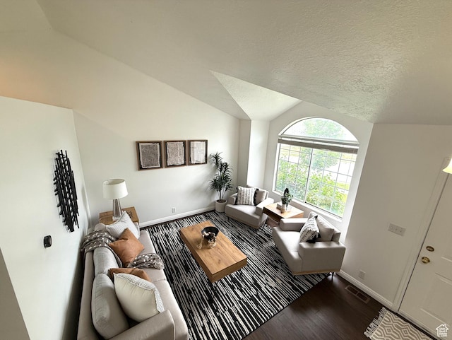 206 E Handcart Way, Sandy, UT 84070 - living area featuring baseboards, wood finished floors, and lofted ceiling
