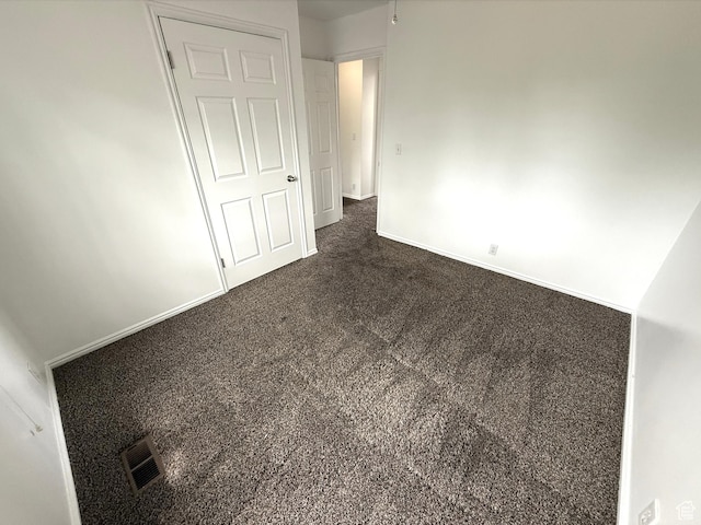 206 E Handcart Way, Sandy, UT 84070 - unfurnished bedroom featuring baseboards and dark carpet