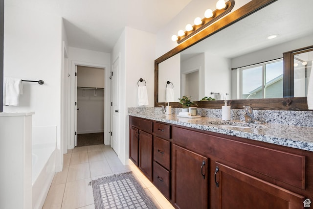 3456 S Linden Way, Syracuse, UT 84075 - full bathroom with double vanity, a garden tub, tile patterned floors, a shower with door, and a spacious closet