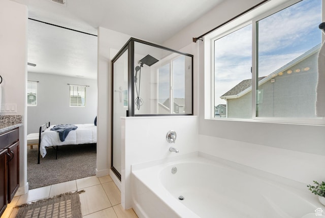 3456 S Linden Way, Syracuse, UT 84075 - bathroom with a shower stall, a bath, vanity, tile patterned floors, and ensuite bathroom