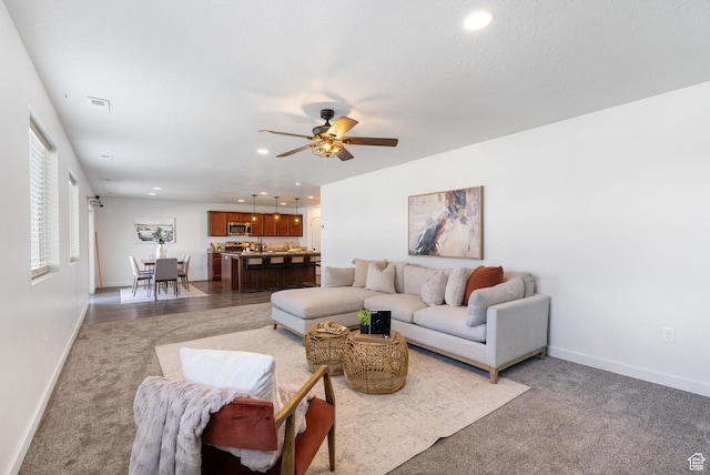 3456 S Linden Way, Syracuse, UT 84075 - living area with a ceiling fan, baseboards, recessed lighting, and carpet floors