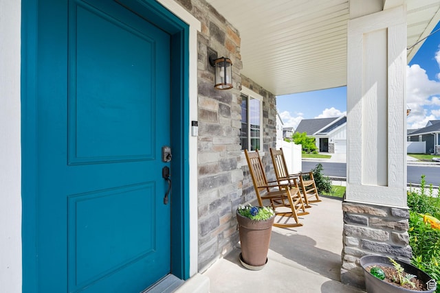 3456 S Linden Way, Syracuse, UT 84075 - entrance to property with covered porch and stone siding