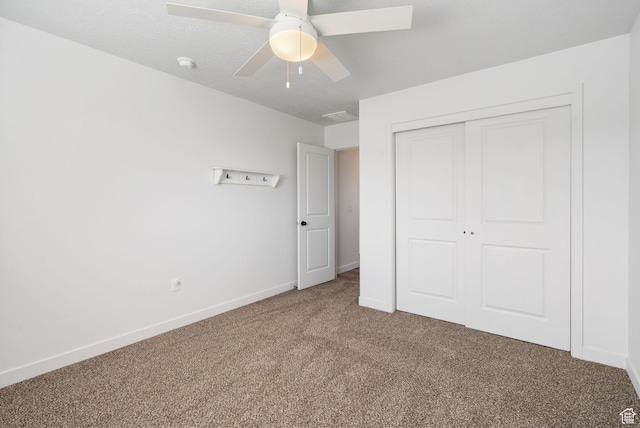 3456 S Linden Way, Syracuse, UT 84075 - unfurnished bedroom featuring carpet floors, a closet, baseboards, and ceiling fan