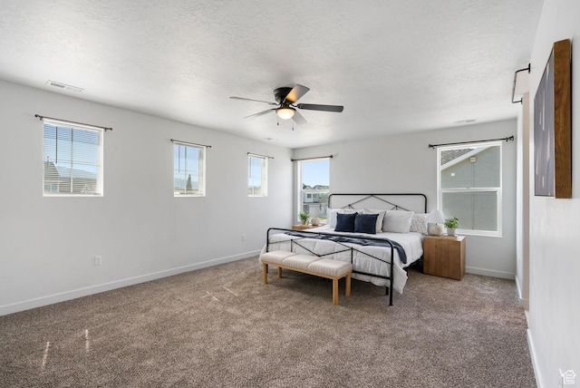 3456 S Linden Way, Syracuse, UT 84075 - bedroom with baseboards, carpet floors, a textured ceiling, and ceiling fan