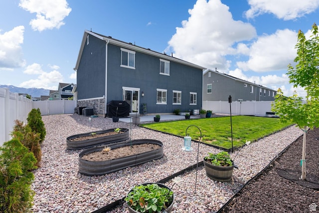 3456 S Linden Way, Syracuse, UT 84075 - back of property with a patio area, a garden, stucco siding, and central air condition unit