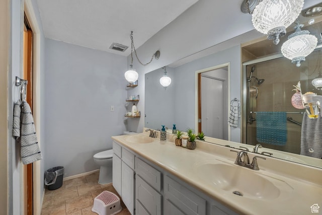 871 E 5575 S, South Ogden, UT 84405 - full bathroom featuring double vanity, a stall shower, toilet, and baseboards