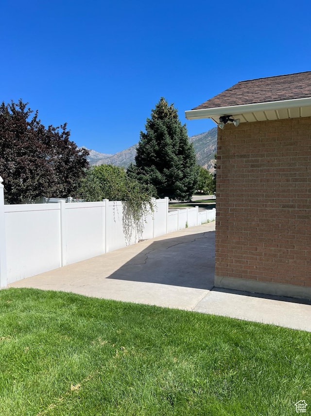 10861 N Panorama Dr, Highland, UT 84003 - view of yard with a patio area and a mountain view
