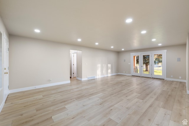 10861 N Panorama Dr, Highland, UT 84003 - unfurnished living room with recessed lighting, light wood-style flooring, and baseboards