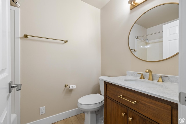 10861 N Panorama Dr, Highland, UT 84003 - bathroom featuring vanity, baseboards, wood finished floors, and toilet