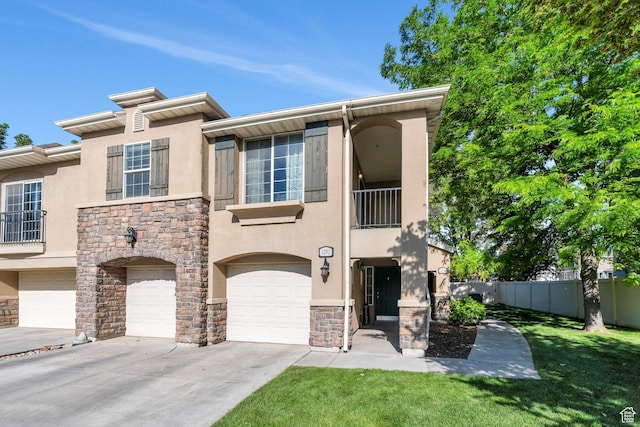 1292 W Dallin Dr N, Pleasant Grove, UT 84062 - multi unit property with stucco siding, stone siding, driveway, an attached garage, and a balcony