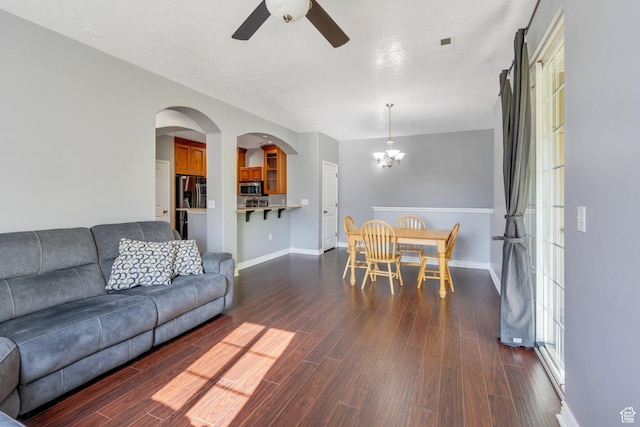 1292 W Dallin Dr N, Pleasant Grove, UT 84062 - living area with ceiling fan, a chandelier, dark wood finished floors, and baseboards