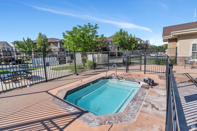 1292 W Dallin Dr N, Pleasant Grove, UT 84062 - view of swimming pool with a hot tub and a residential view