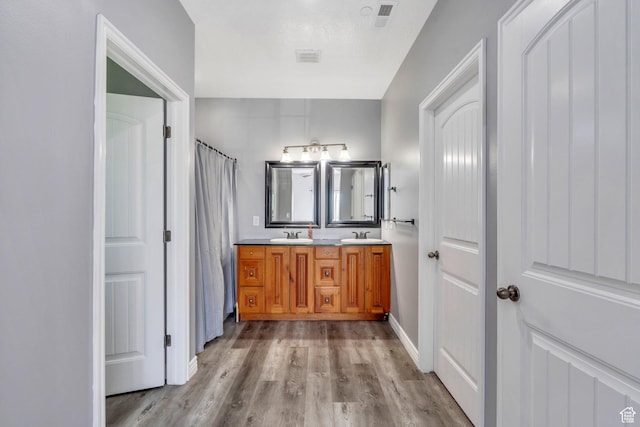 1292 W Dallin Dr N, Pleasant Grove, UT 84062 - full bath featuring double vanity, wood finished floors, and a shower with curtain